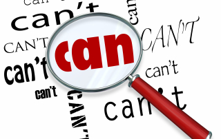 A magnifying glass finds the word Can among many instances of Can't symbolizing a unique positive attitude and resilience to defeat the odds and achieve success
